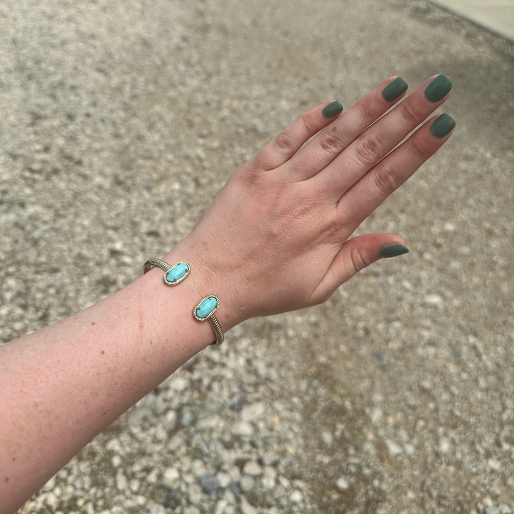 Gold and teal Kendra Scott cuff